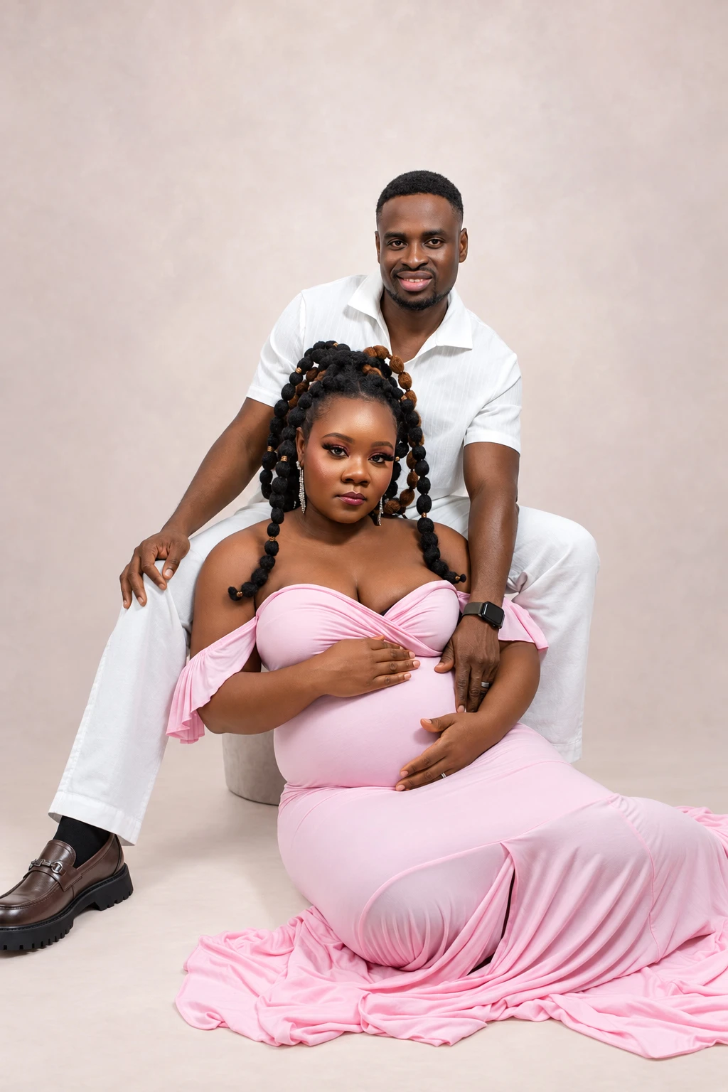 A couple posing together during their maternity session